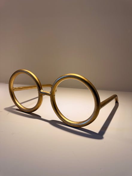 Lente Redondo Mega – Oro y Negro