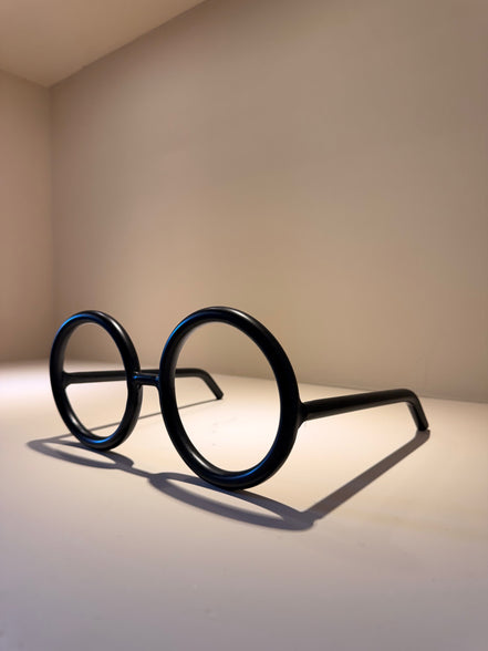 Lente Redondo Mega – Oro y Negro