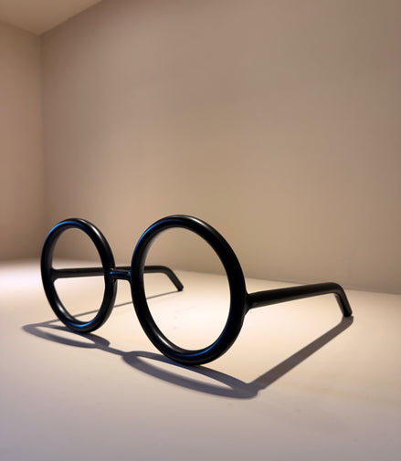 Lente Redondo Mega – Oro y Negro